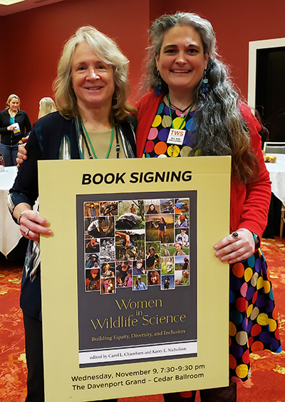 Carol Chambers left and Kerry Nicholson coeditors ofem Women in Wildlife Science Building Equity Diversity and Inclusionem at The Wildlife Society meeting Fall 2022