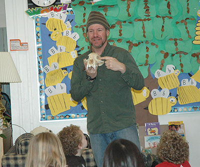 Tom Griffin delivers a bear safety presentation in an Anchorage classroom