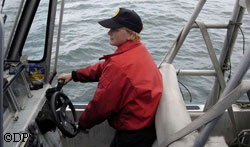 Boat Officer Amanda Barnette helps out with the patrol of commercial fishing in the Bristol Bay area in July