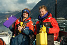 Gail Blundell and Jayson Owen on the back deck of the Steller in Endicott Arm Owen is sporting a black eye from a particularly boisterous seal