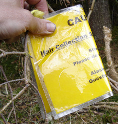 A sign at Sawmill Creek alerts kayakers picnickers and anglers that hair snares are in the area