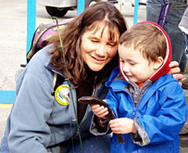 Patti Berkhahn Habitat Division with her grandson It was his first fish