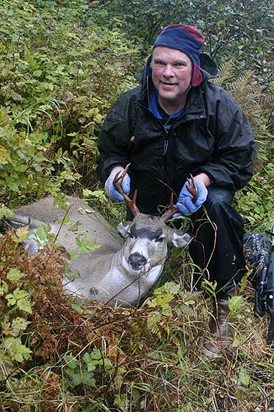 The author with a Sitka blacktailed deer