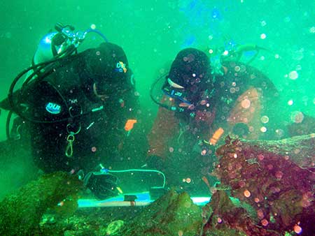 The author Jeff Meucci and Joe Stratman conducting a sea cucumber stock assessment survey in Southeast Alaska