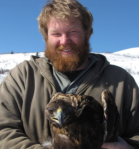 Wildlife biologist Chris Barger with a golden eagle Golden eagles are considered a quotStewardship Speciesquot in the Alaska Wildlife Action Plan Photo by Travis Booms
