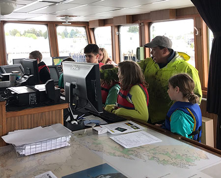 Aboard the bridge of the ADFampG research vessel Kestrel