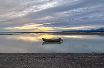 Figure 3. &mdash; Commercial setnet skiff anchored in Dry Bay.