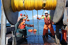 Figure 4. &mdash; Crew members from NOAA, ADF&G, and DIPAC.