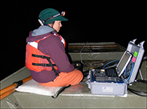 Figure 9. &mdash; Conducting a nighttime hydroacoustic survey.