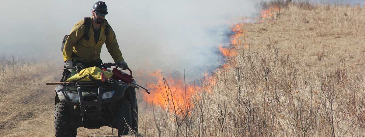 ATV with drip Torch - Alaska Department of Fish and Game